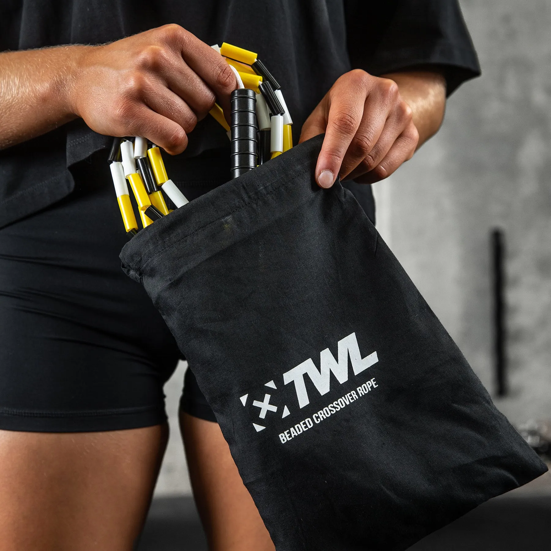 TWL - BEADED CROSSOVER ROPE - BLACK/WHITE/YELLOW